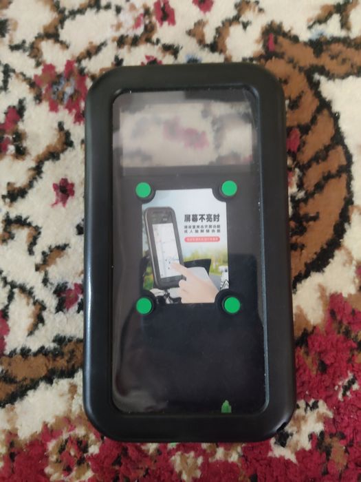 Telefon ushlagich velosiped uchun yomgʻirli havolarga zoʻr