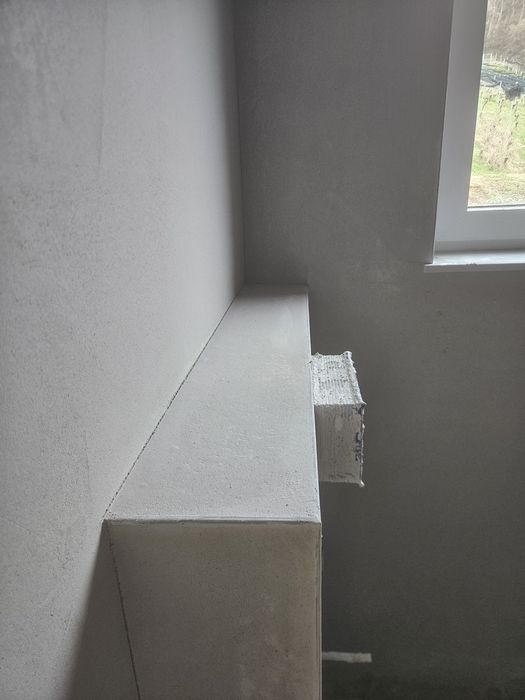 Execut tencuială mecanizată