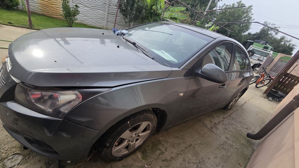 Chevrolet cruze capota faruri bara aripa aripi usi usa oglinda Scaune interior portbagaj hayon volan bord airbag cutie viteze electromotor trager far