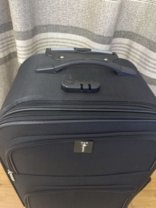 Чемодан два новых чемодана.