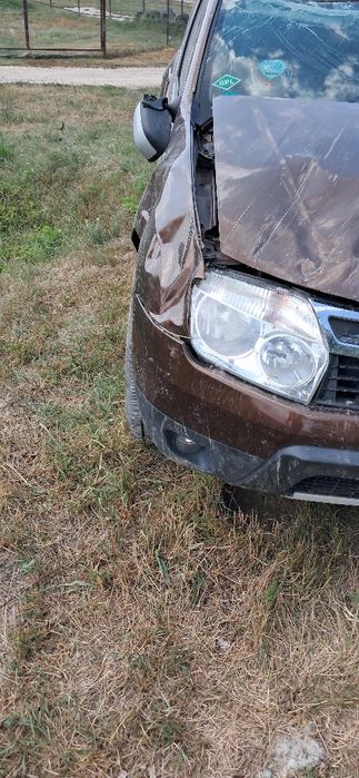 Dacia duster 1.6 benzina  si gpl, avariata