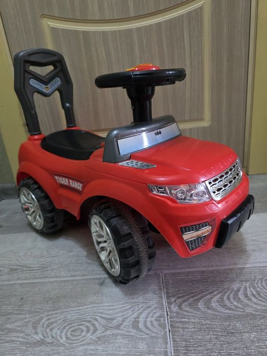 Детская машинка толокар