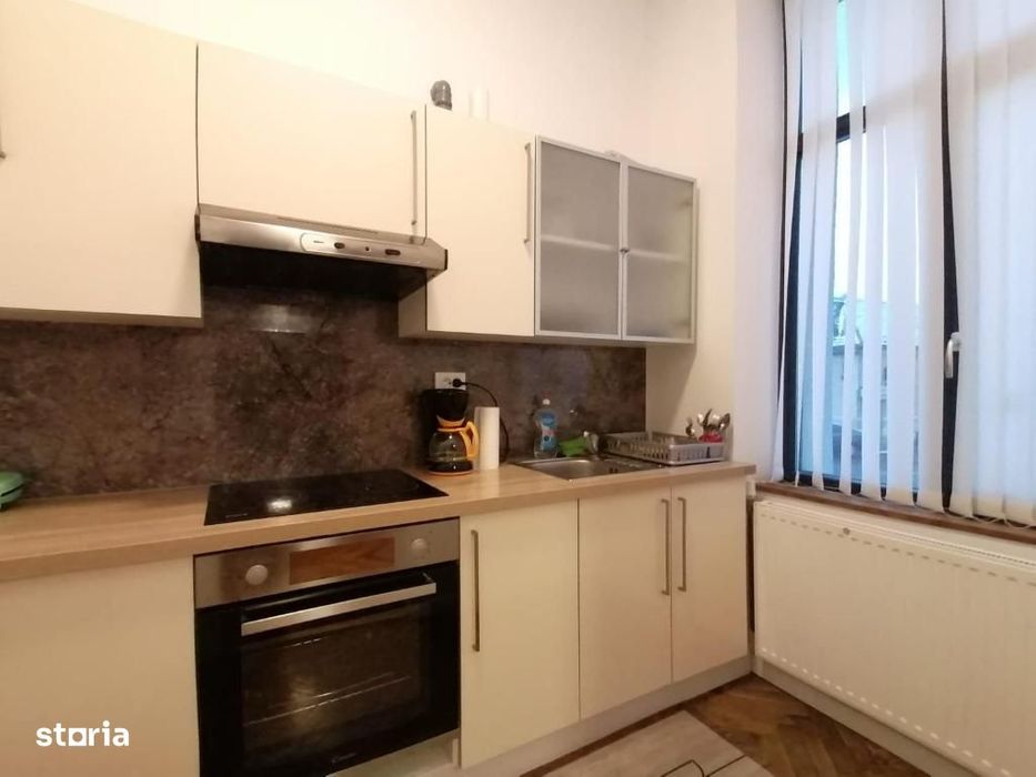 Apartament cu 3 camere - curte cu foisor + spatiu parcat masina