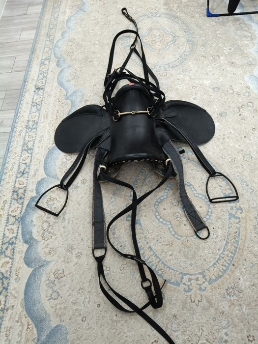 Седло для лошади