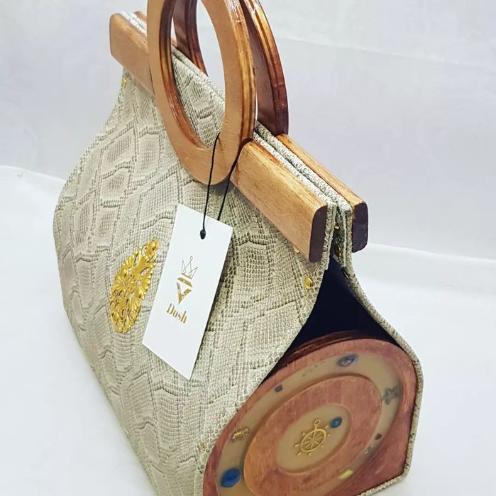 Кожаные сумки и портмоне ручной работы