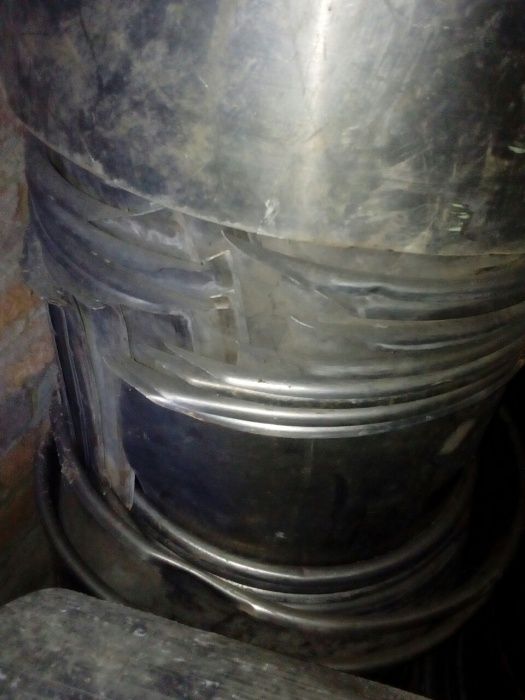 Разрезанные бочки от стиральной машины