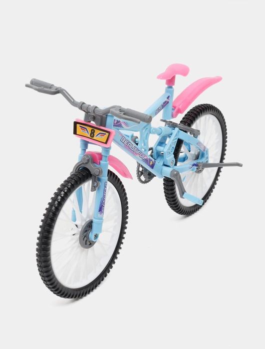 Кукла барби на велосипеде