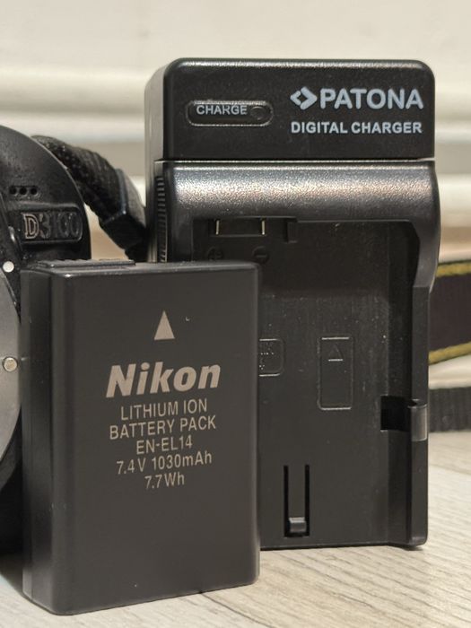 Nikon D3100 kit body + obiectiv AF‑S 18‑55mm VR + baterie EN‑EL14 + încărcător Patona