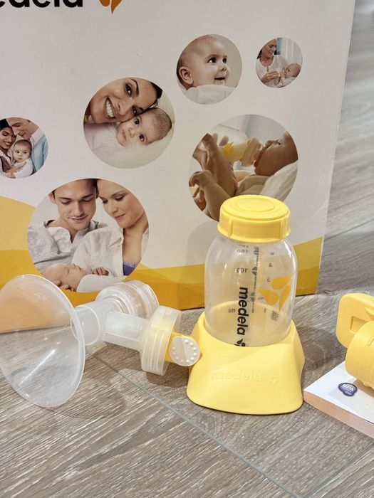 Электрический молокоотсос MEDELA