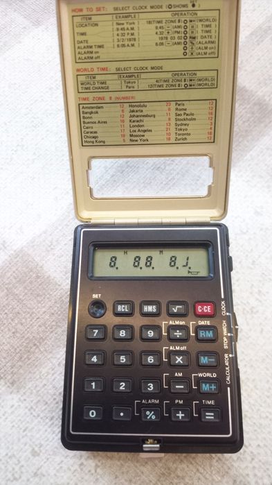 Калкулатор "Sharp" със часовник