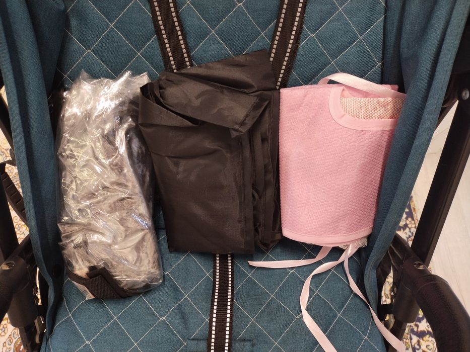 Бала сүйрететін арба. Коляска детский