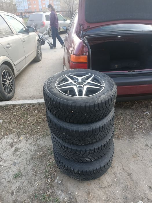 Продам титанки и резиной на 14 ,4х100 ,резину можно докатать