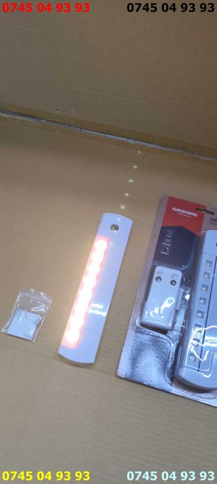 sistem iluminare led GRUNDIG cu telecomanda si suport de perete
