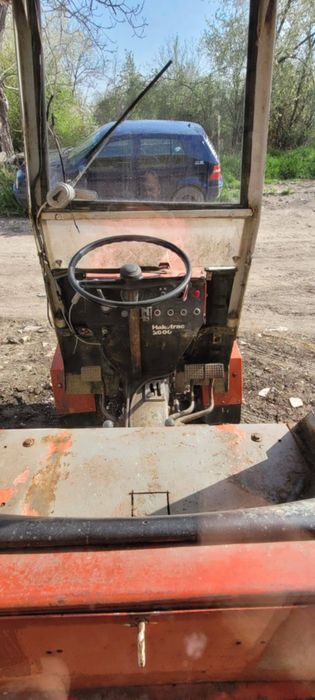 Трактор със косачка