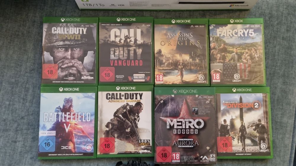 Xbox one 1 TB cu 2 manete si 9 jocuri