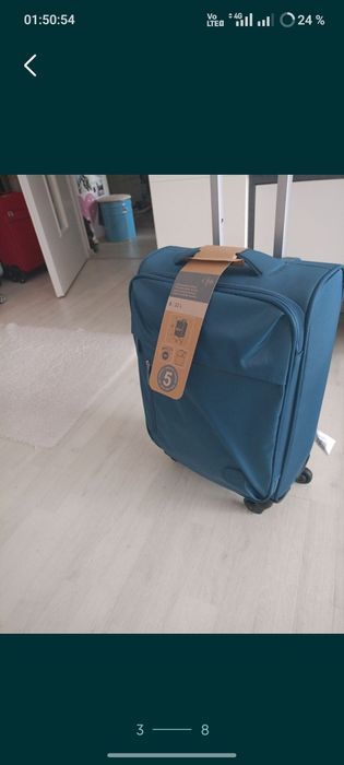 Vând troler material textil,dimensiune de 55 cm,nou, produs calitate.