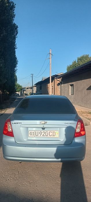 Lacetti 2013  1.6 avtomat karobka