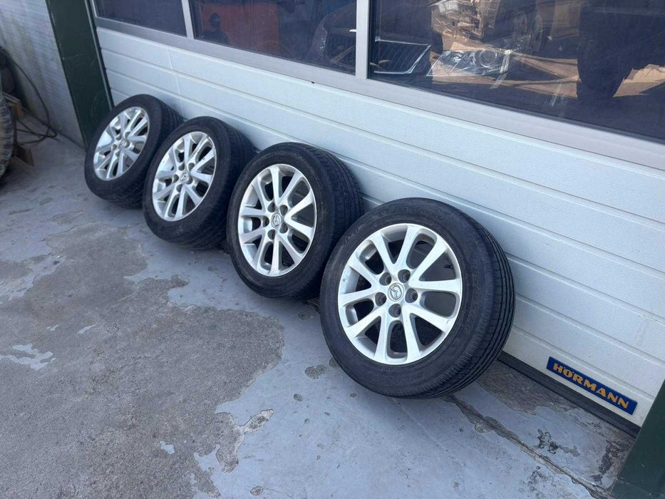 Jante Aliaj  Mazda 3 R16 Cu Caucucuri de Vara