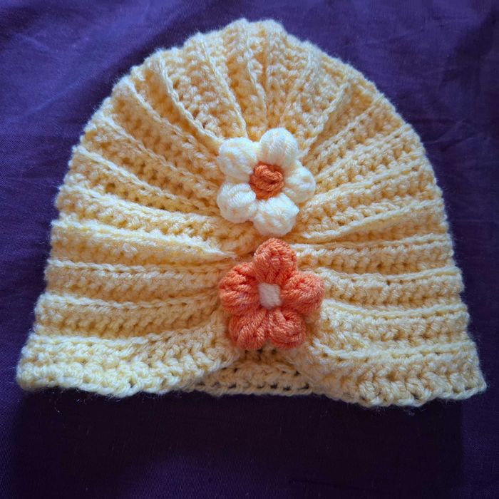 Бебешка ръчно плетена зимна ( шапчица (03-09м)