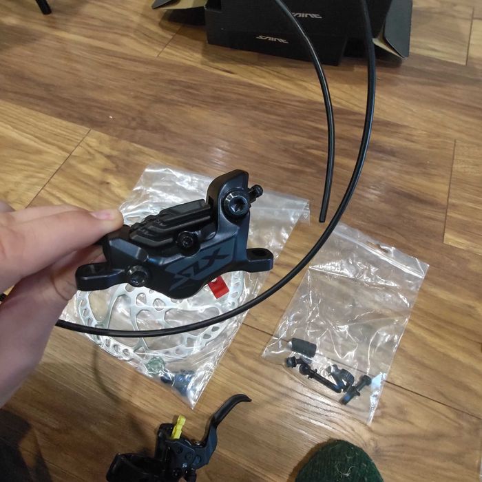 Set Frane Shimano SLX BL-M7100 + BRM7120 - 4 pistoane