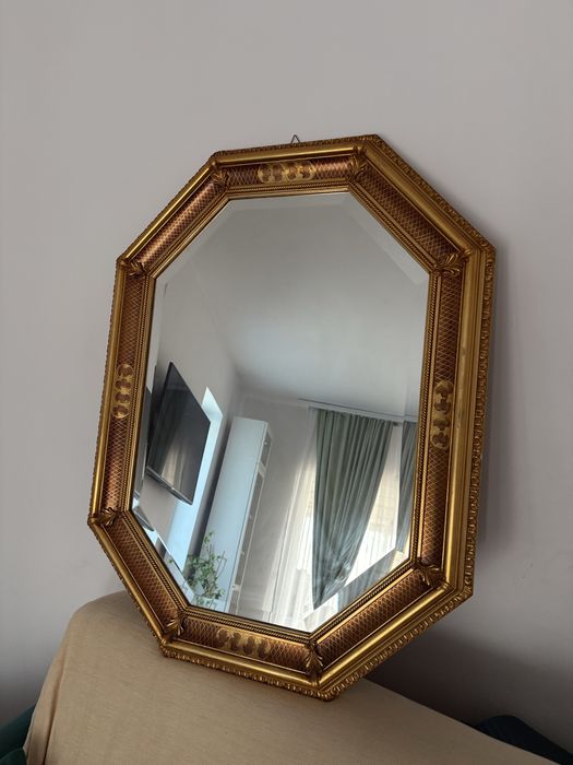 Oglinda de perete octogonala, rama aurie lemn/rasina