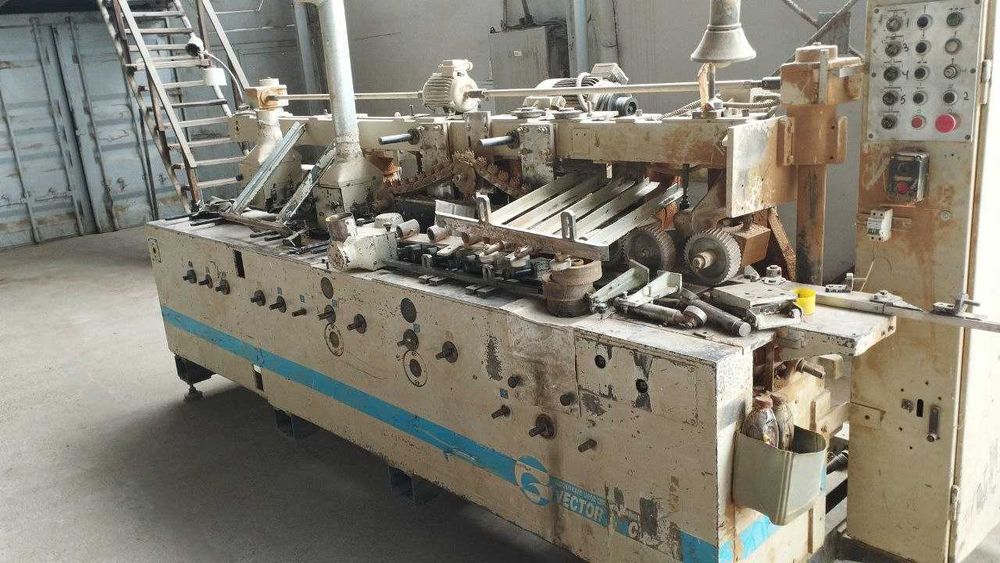 Четырёхсторонний продольно фрезерный станок