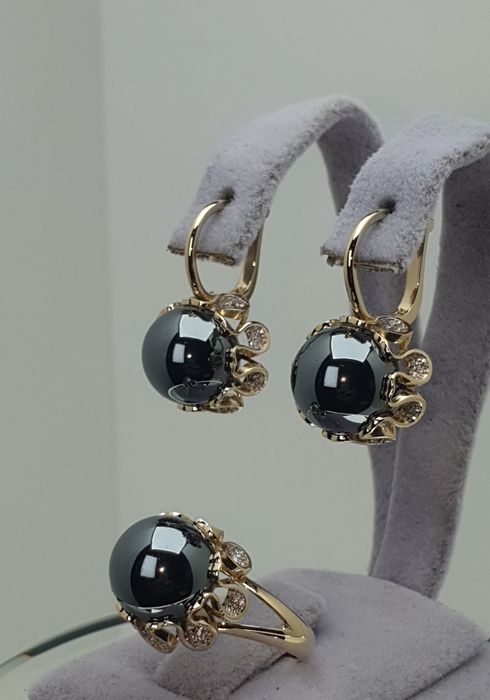 Комплект с бриллиантом 850.000сум 1грам нархи