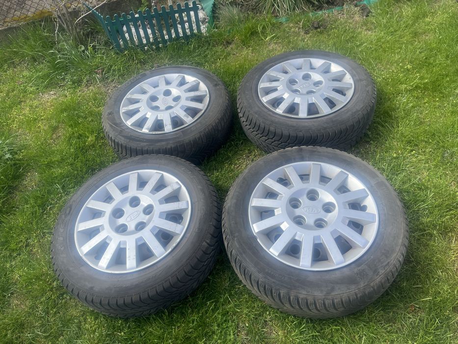 Джанти с гуми и оригинални тазове 15-ки за КИА