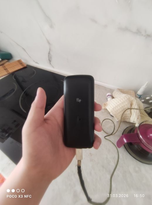 Продам кнопочный телефон fly