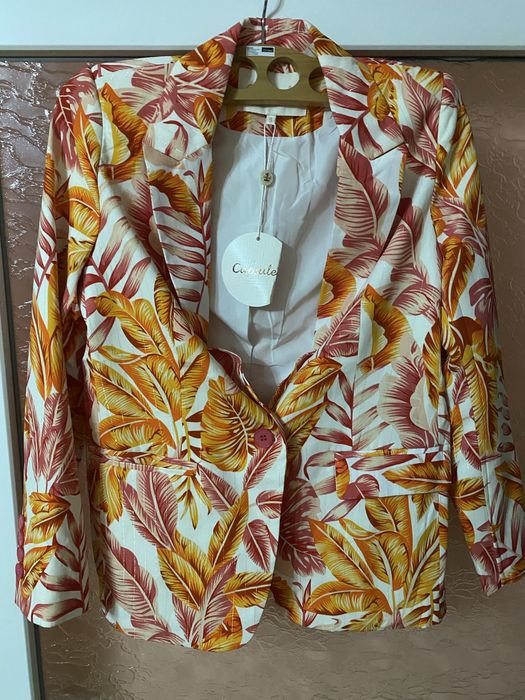 Sacou nou, cu eticheta