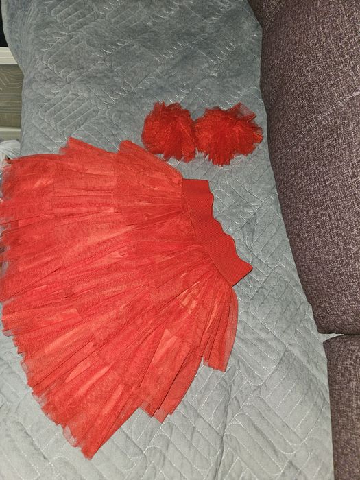 Продам красную юбку с бантами