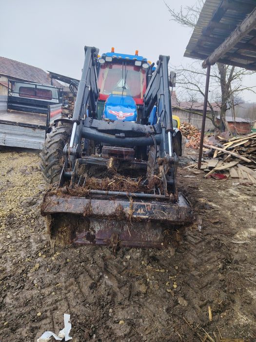Vând New Holland TS 100