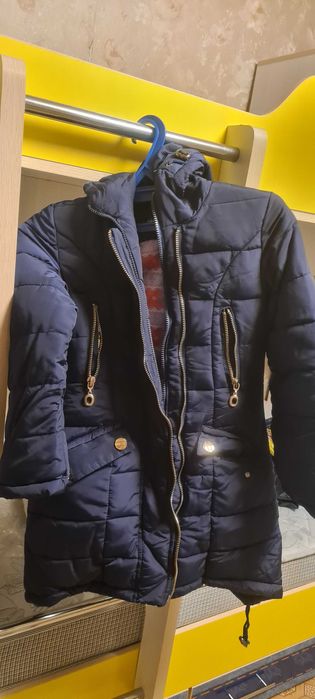 Продам зимние куртки б/у