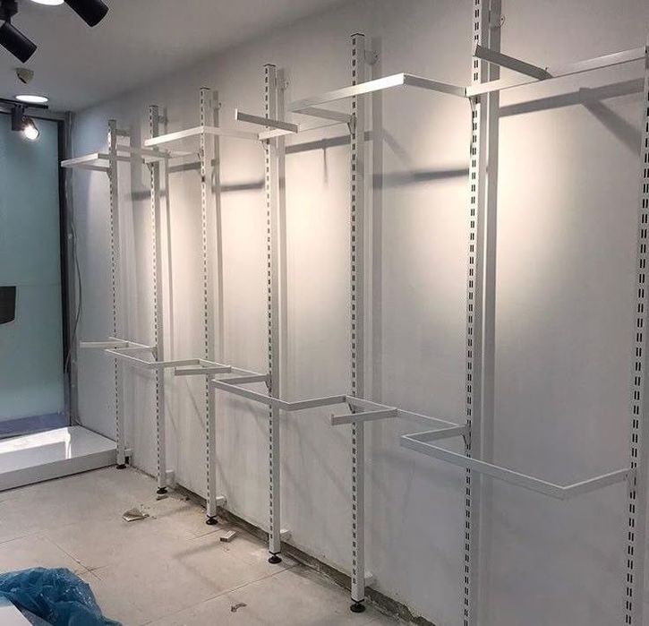 Стеллажи для магазинов одежды,рельсы,регулировочные стеллажи