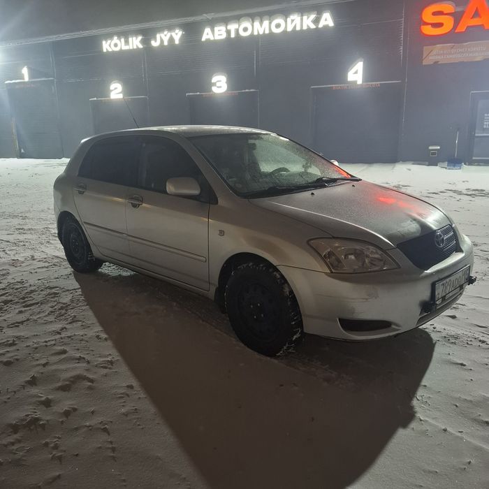 Тойота Королла е120 хэтчбек 2003год