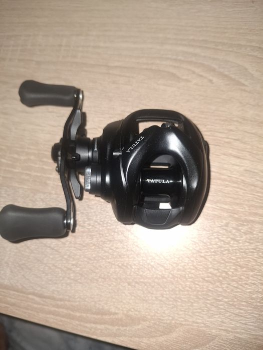 Макара Daiwa Tatula TW 100XHL(left handle)+Въдицата Daiwa Tatula 7-28g