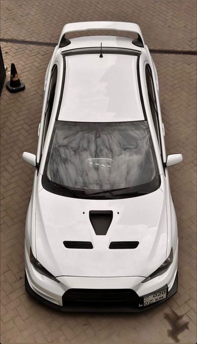 Продаю бампер на митсубиси лансер 10 тюнинг обвес gt400