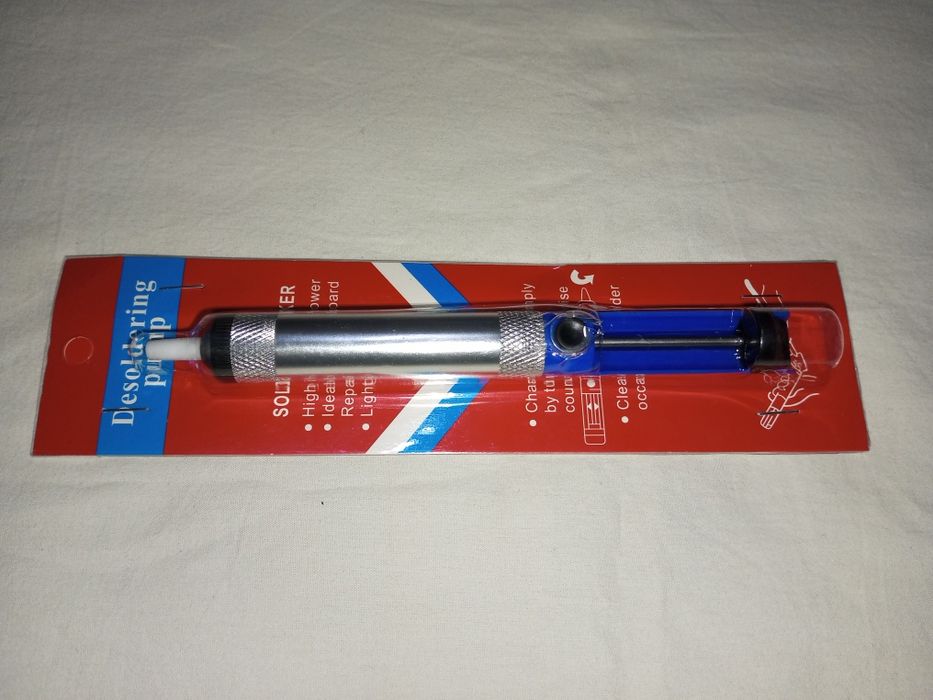 Олово отсос для паяльных работ.