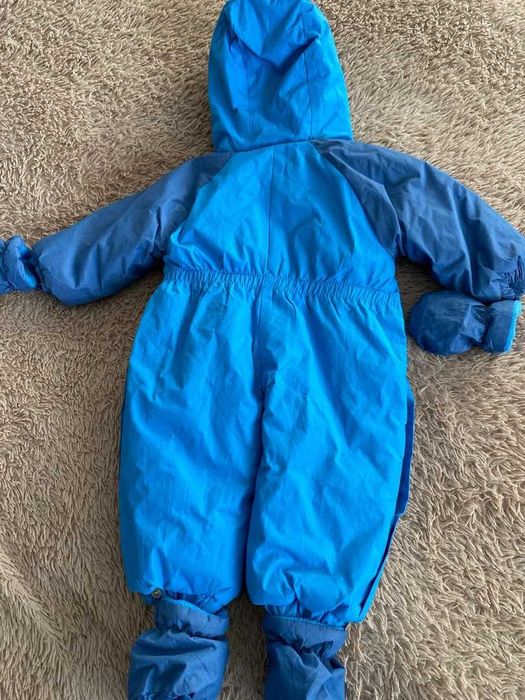 Продам детские комбинезоны .