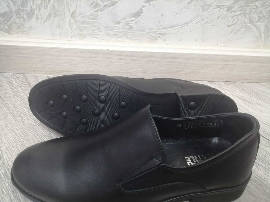 Продам кожанные туфли