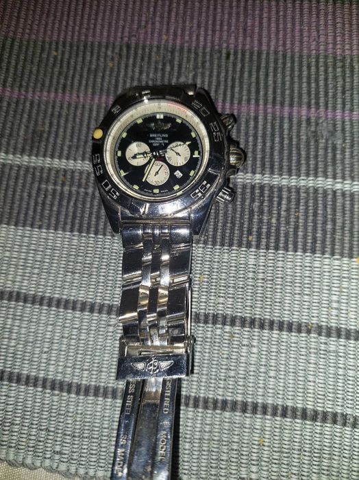 2 ceasuri barbatesti , unul Breitling si altul Slazenger