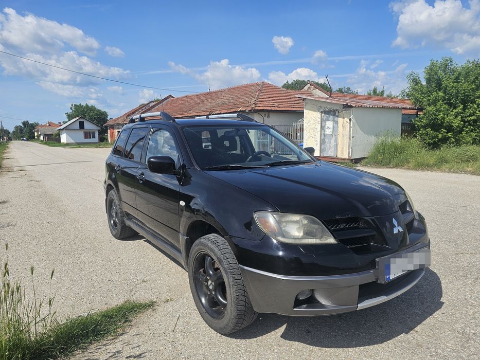 Mitsubishi Outlander 2.4 Бензин/ГАЗ