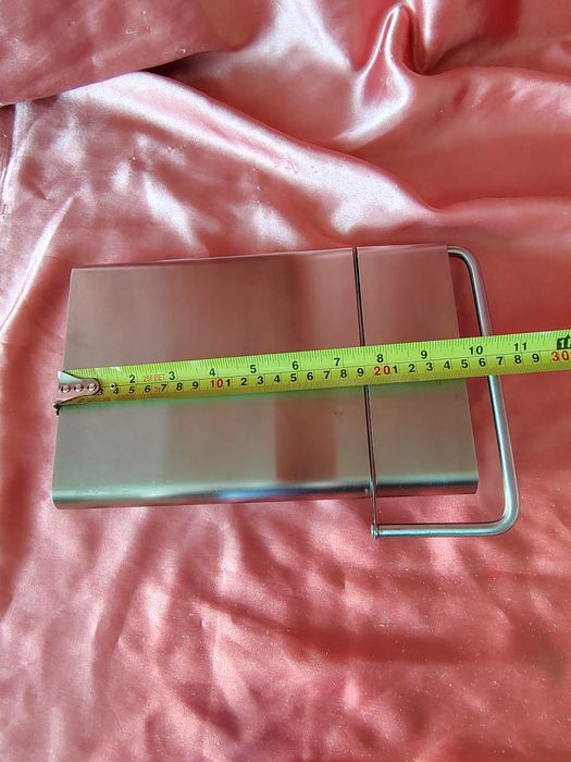 Tăietor din inox pentru brânzeturi