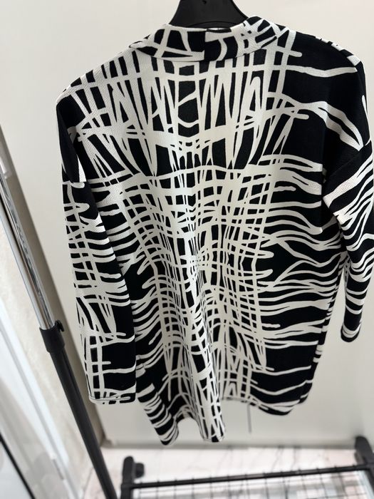 Ефектна връхна дреха