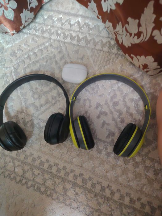 Продам наушники в корпусе новые чёрные новые а зелёные б/у