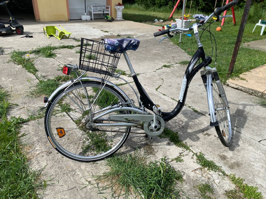 Bicicletă damă Hercules 28” City Bike cu suspensie și coș