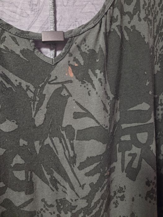 Vind rochie   de culoare  verde kaki  marimea  9xl  are un mic defect  se vede  în poza