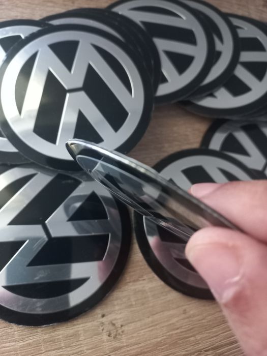 VW - Embleme aluminiu autoadezive pentru capace jante aliaj