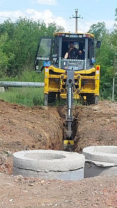 Услуги экскаватора погрузчика три в одном