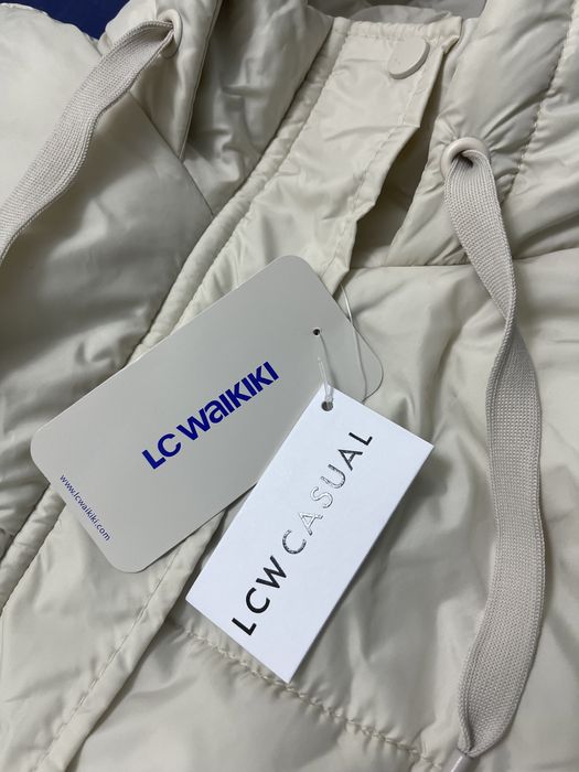 Женская новая безрукавка